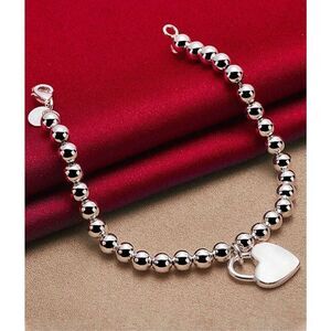 Silver Heart Lock Beaded Bracelet